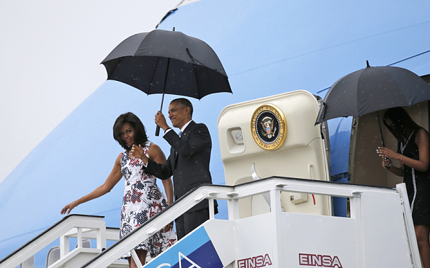 U.S. President Barack Obama and his wife Michelle exit Air Force One as they arrive at Havana's international airport for a three-day trip, in Havana March 20, 2016. REUTERS/Carlos Barria